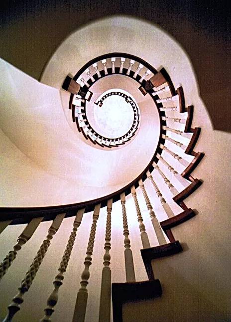 curved staircase looking up